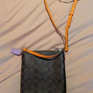 Coach Black Signature Crossbody with Orange Strap and Lilac Tag